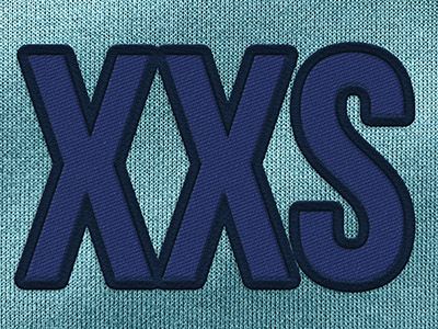 XXS als geweven layout op groen-blauwe textiel